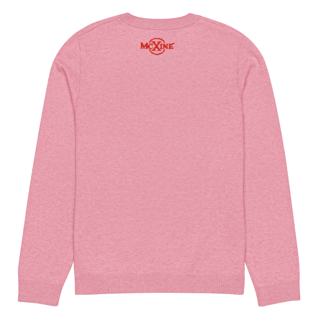 Pink knitted jumper, back view with McXine logo at the neck