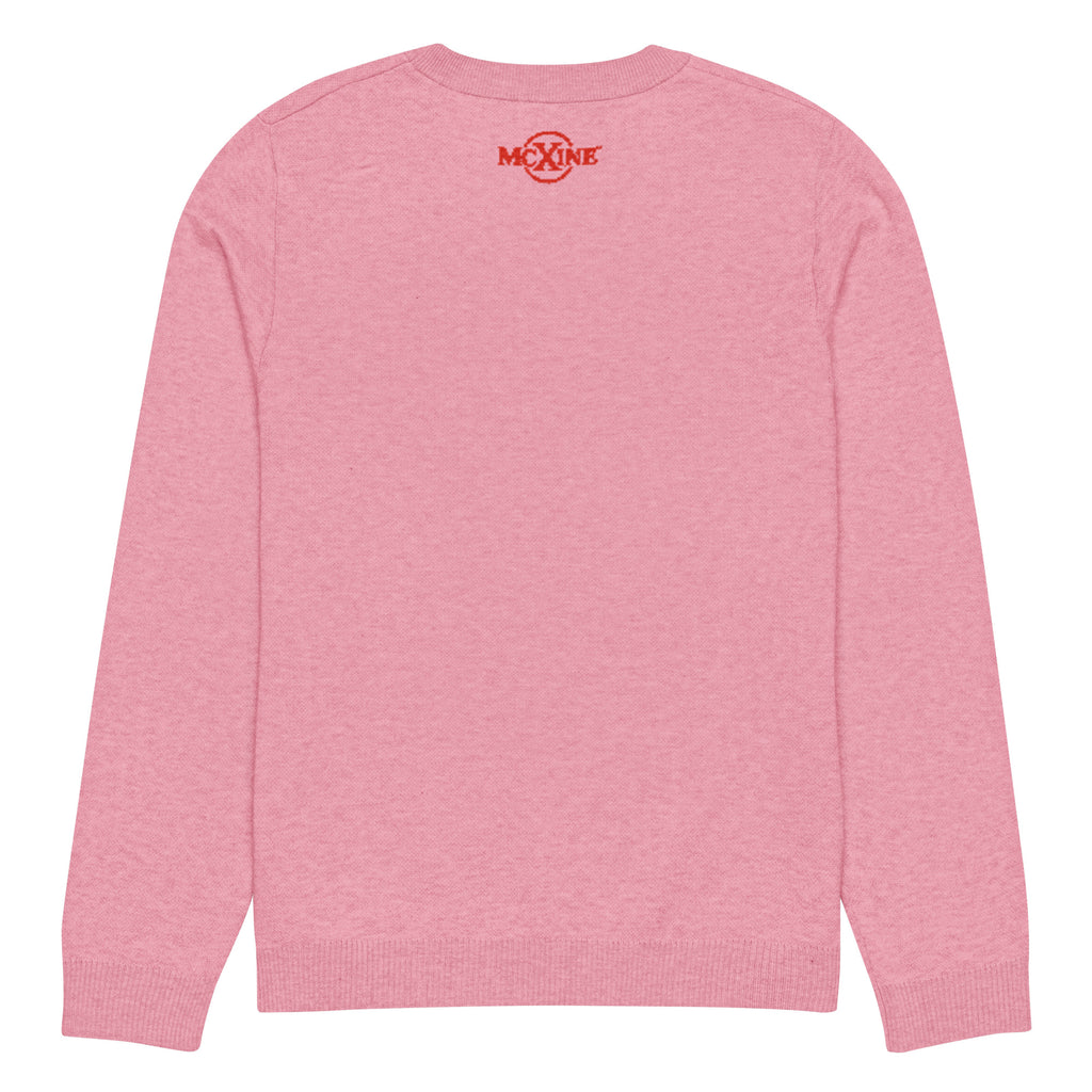Pink knitted jumper, back view with McXine logo at the neck