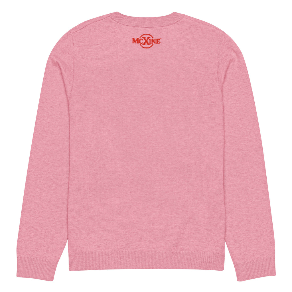 Pink knitted jumper, back view with McXine logo at the neck