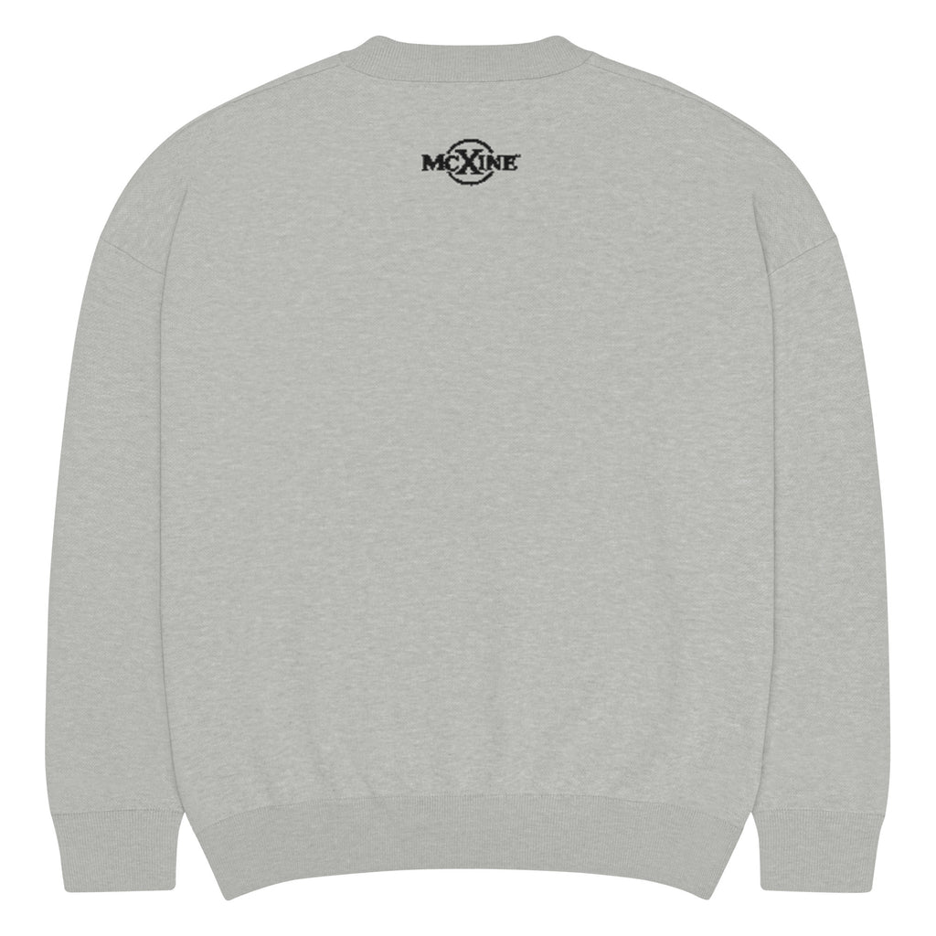 Light grey relaxed-fit knitted jumper, back view with MC X INE logo at the neck
